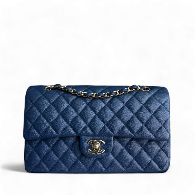 Best bags for weekend getawaysChanel Classic Flap Medium - Caviar 25CM Quilted Dark Blue Gold Hardware Series 27