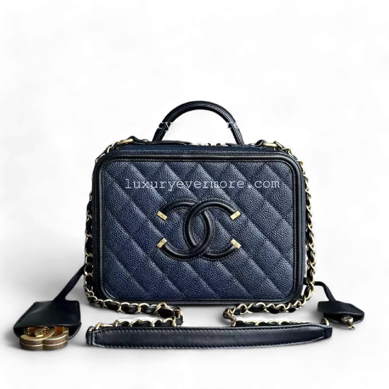 Luxury bags with exotic skinsChanel Vanity Case Filigree - Caviar Quilted Blue Black Golden Hardware